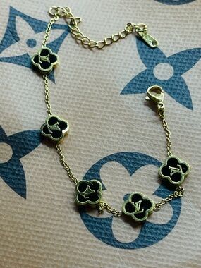 Gold stainless steel Bracelet with Black Monogram Flower Charms